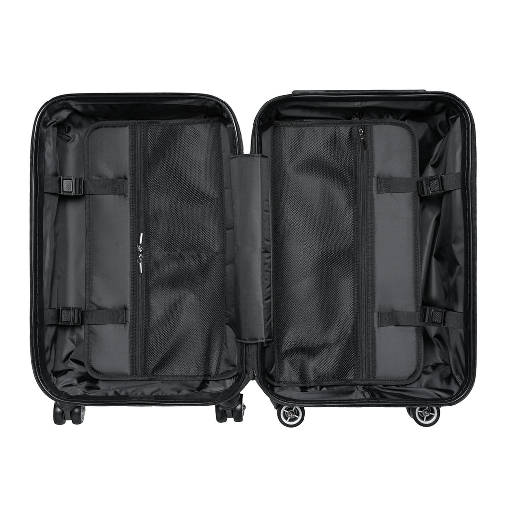 Ruff Part of Town black hard-shell carry-on suitcase interior with mesh pockets and straps.