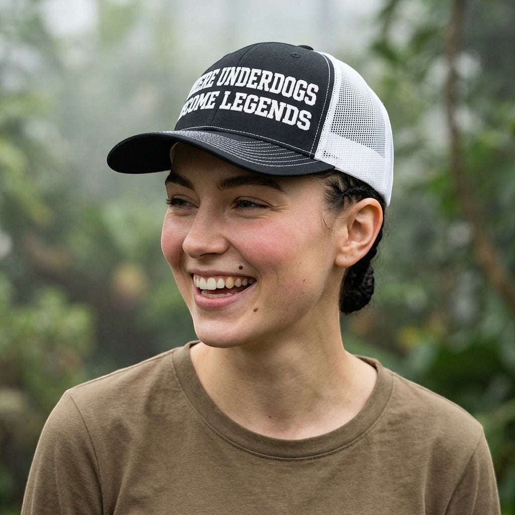 Ruff Part of Town black and white trucker cap with "WHERE UNDERDOGS BECOME LEGENDS" text. Features mesh back and adjustable snap closure.