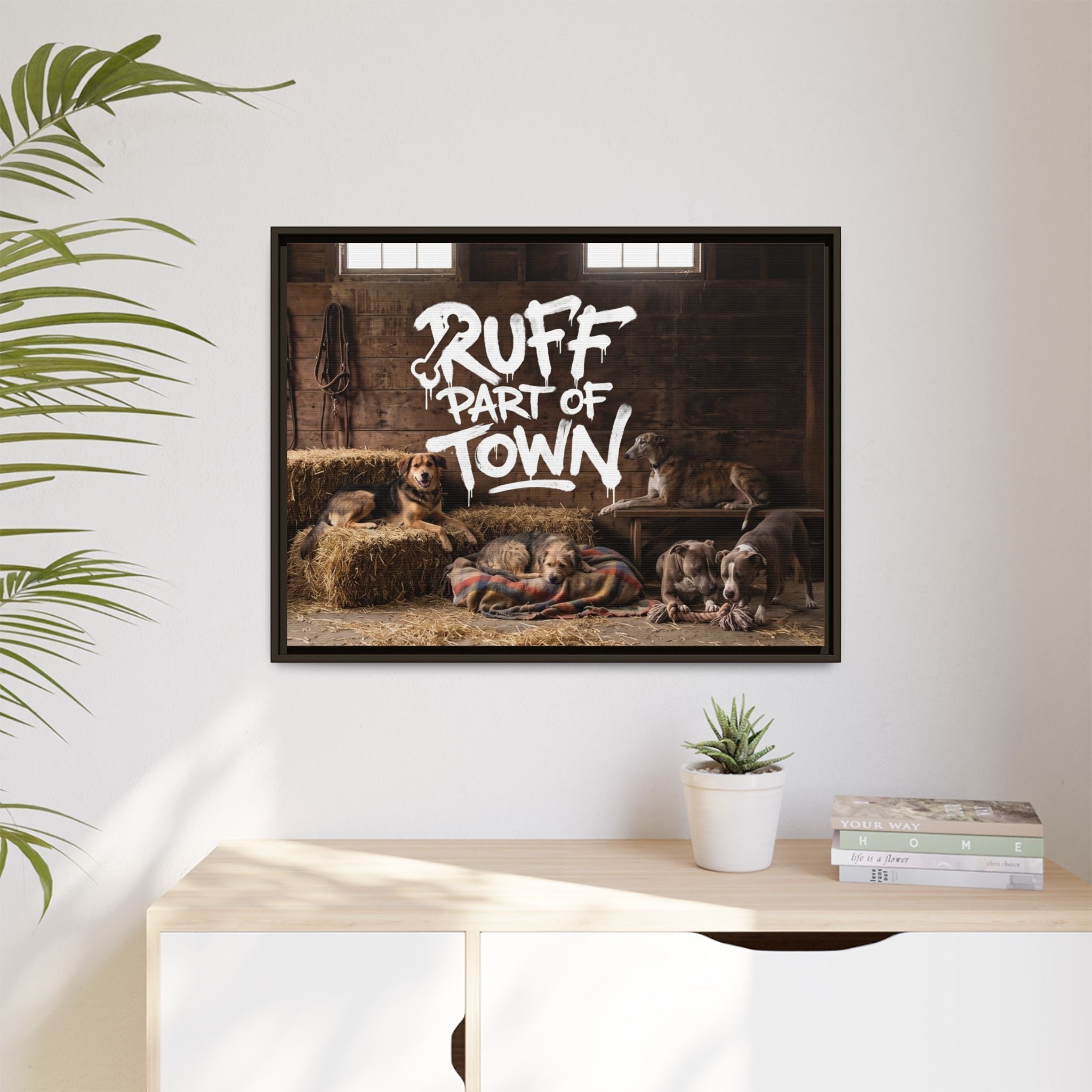 Ruff Part of Town framed canvas art featuring dogs resting on hay bales in a barn with white graffiti text.