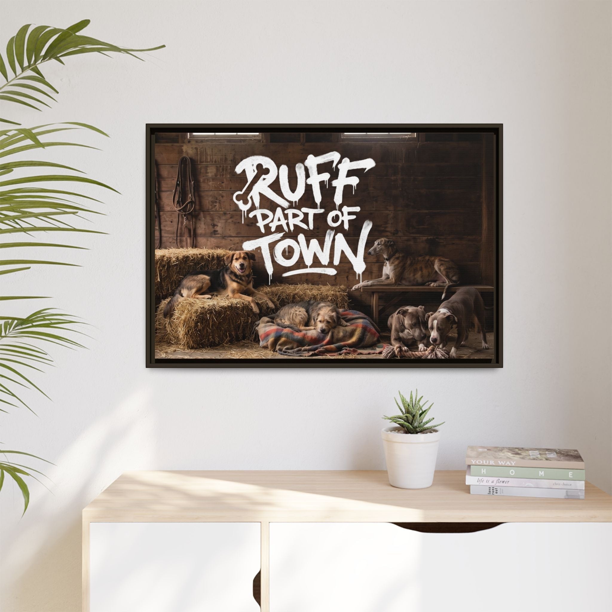 Ruff Part of Town framed canvas art featuring sleepy dogs on hay bales and a wooden barn interior with graffiti text.