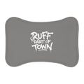Ruff Part of Town grey bone-shaped dog feeding mat with white graffiti print. Non-slip polyester and memory foam.