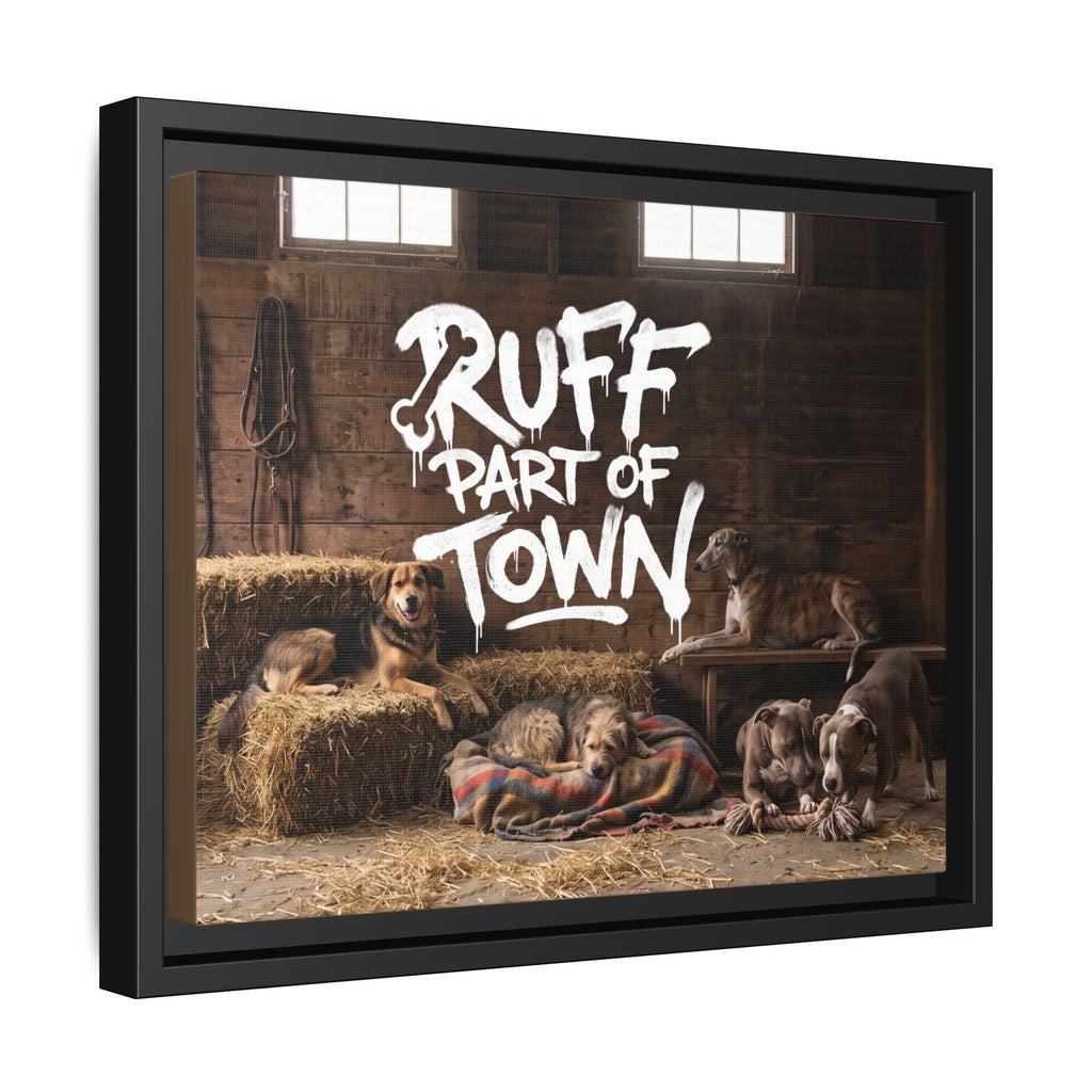 Ruff Part of Town framed canvas art featuring a group of dogs resting in a rustic barn setting with hay bales and a colorful blanket.