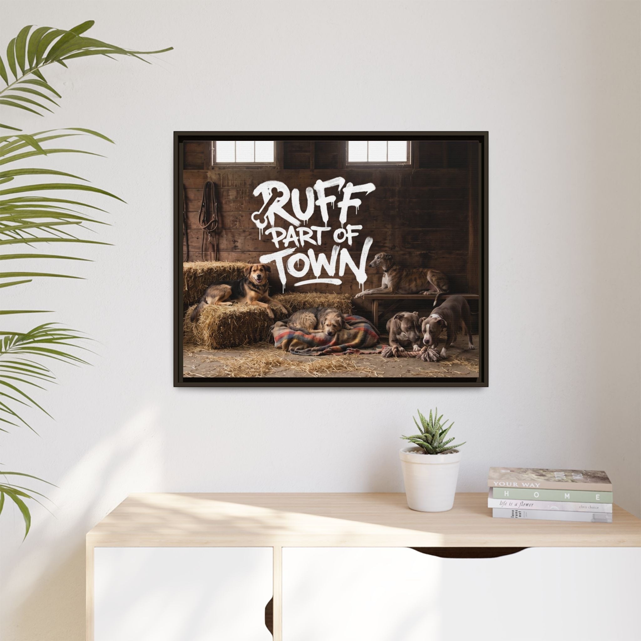 Ruff Part of Town framed canvas wall art featuring sleepy puppies and dogs in a rustic barn setting with hay bales.