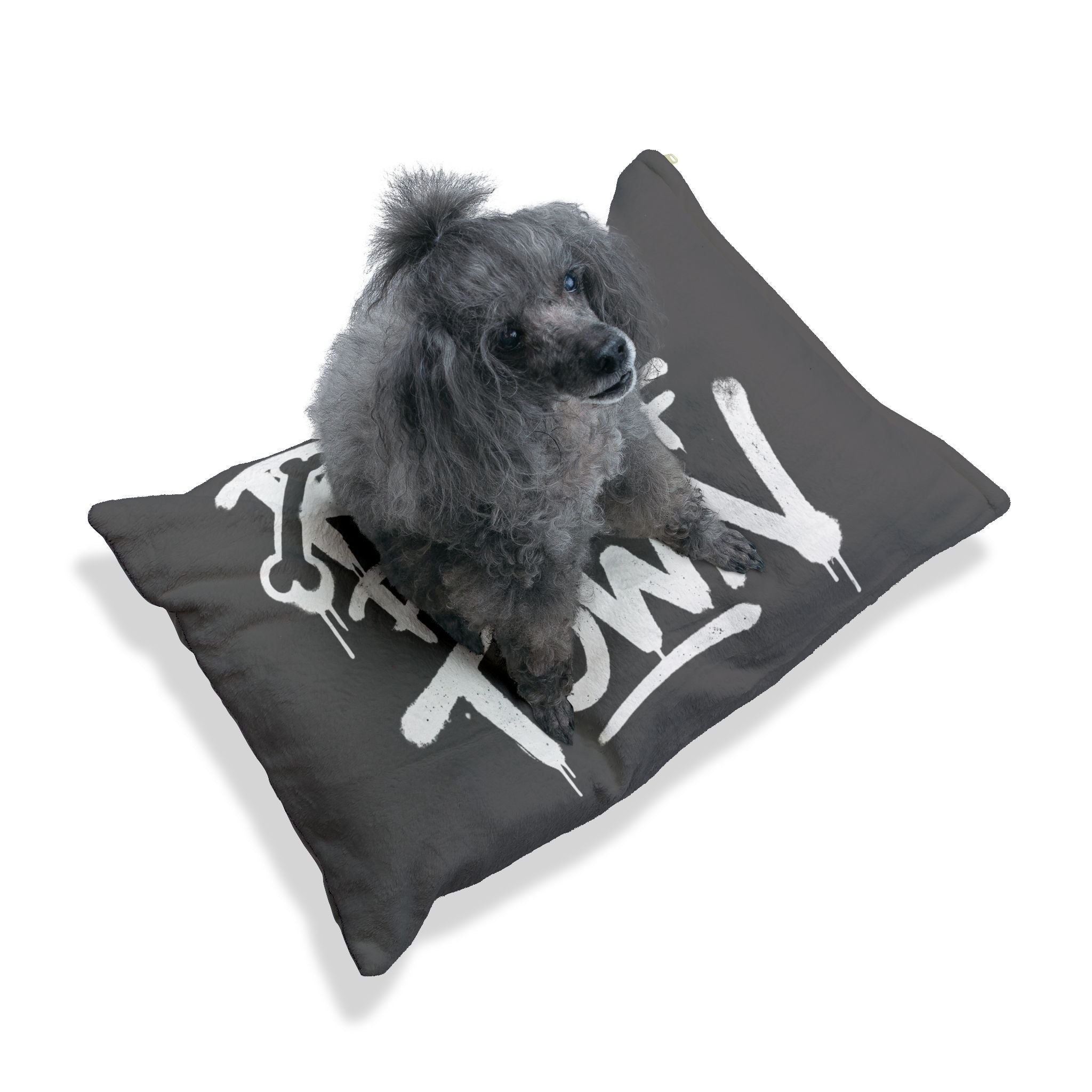 Ruff Part of Town gray dog bed with white graffiti text, coral fleece top, and cotton duck underside. A poodle sits on the bed.