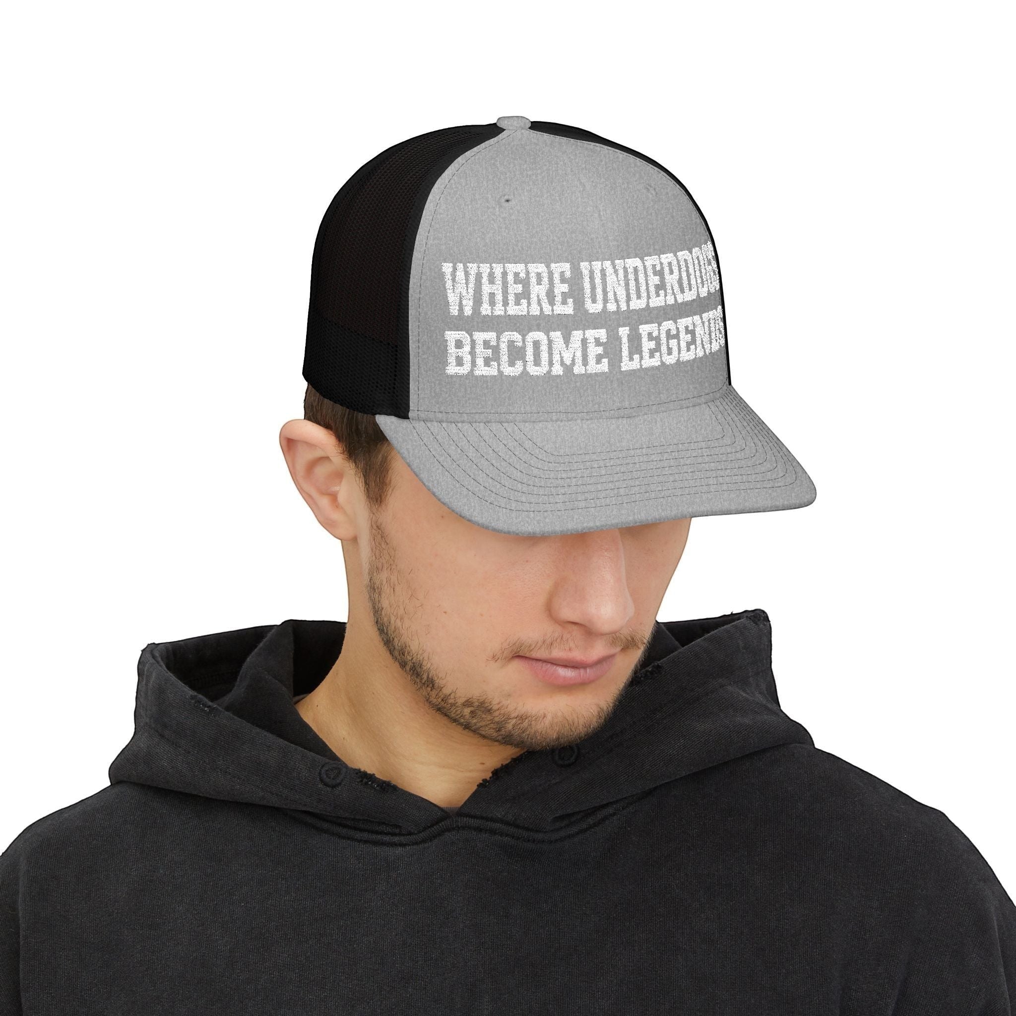 Ruff Part of Town grey and black trucker cap with "WHERE UNDERDOGS BECOME LEGENDS" text.