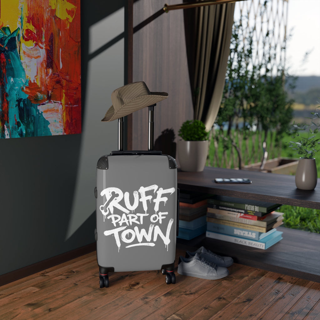 Ruff Part of Town grey hard-shell carry-on suitcase with graffiti print, telescopic handle, and swivel wheels.