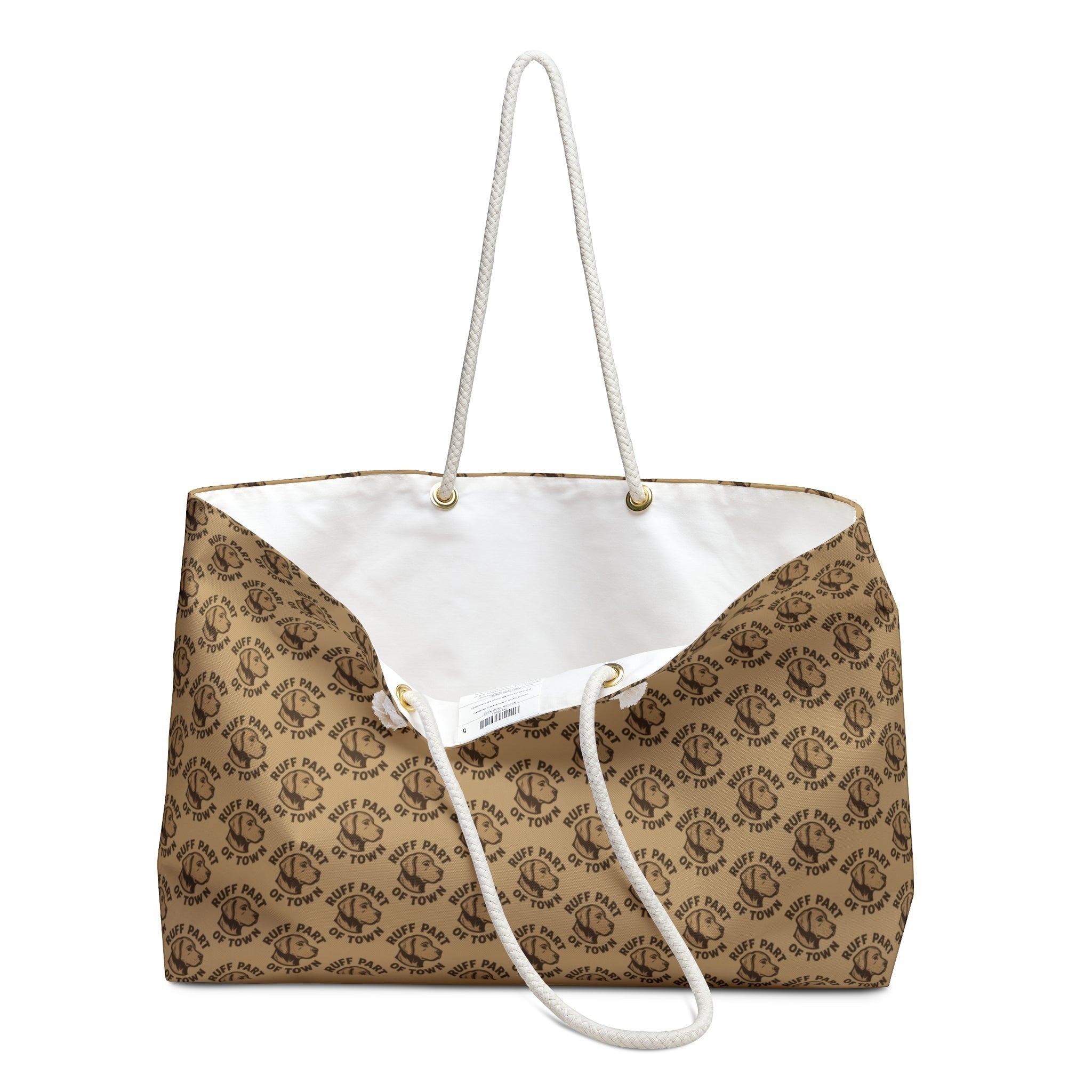 Ruff Part of Town logo pattern weekender bag with cream rope handles and gold-tone grommets. Durable spun polyester exterior.