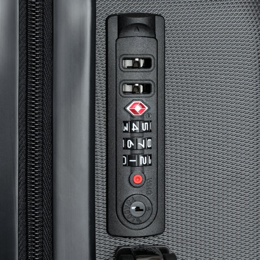 Ruff Part of Town hard-shell suitcase lock with TSA approved combination lock and keyhole.
