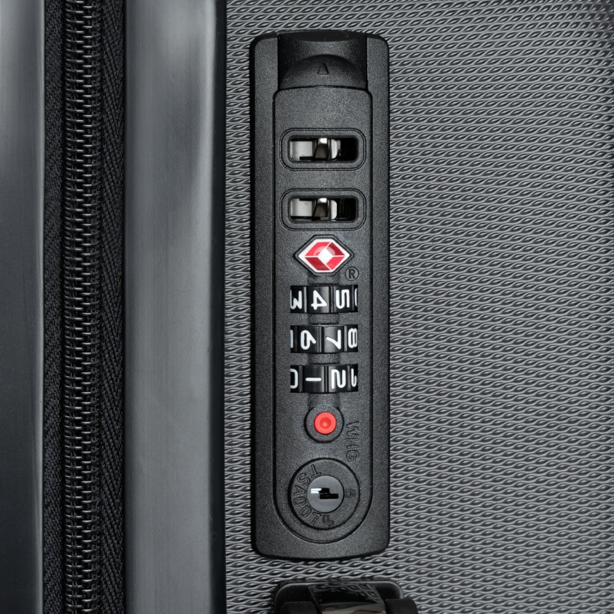 Ruff Part of Town hard-shell suitcase lock with TSA approved combination lock and keyhole.