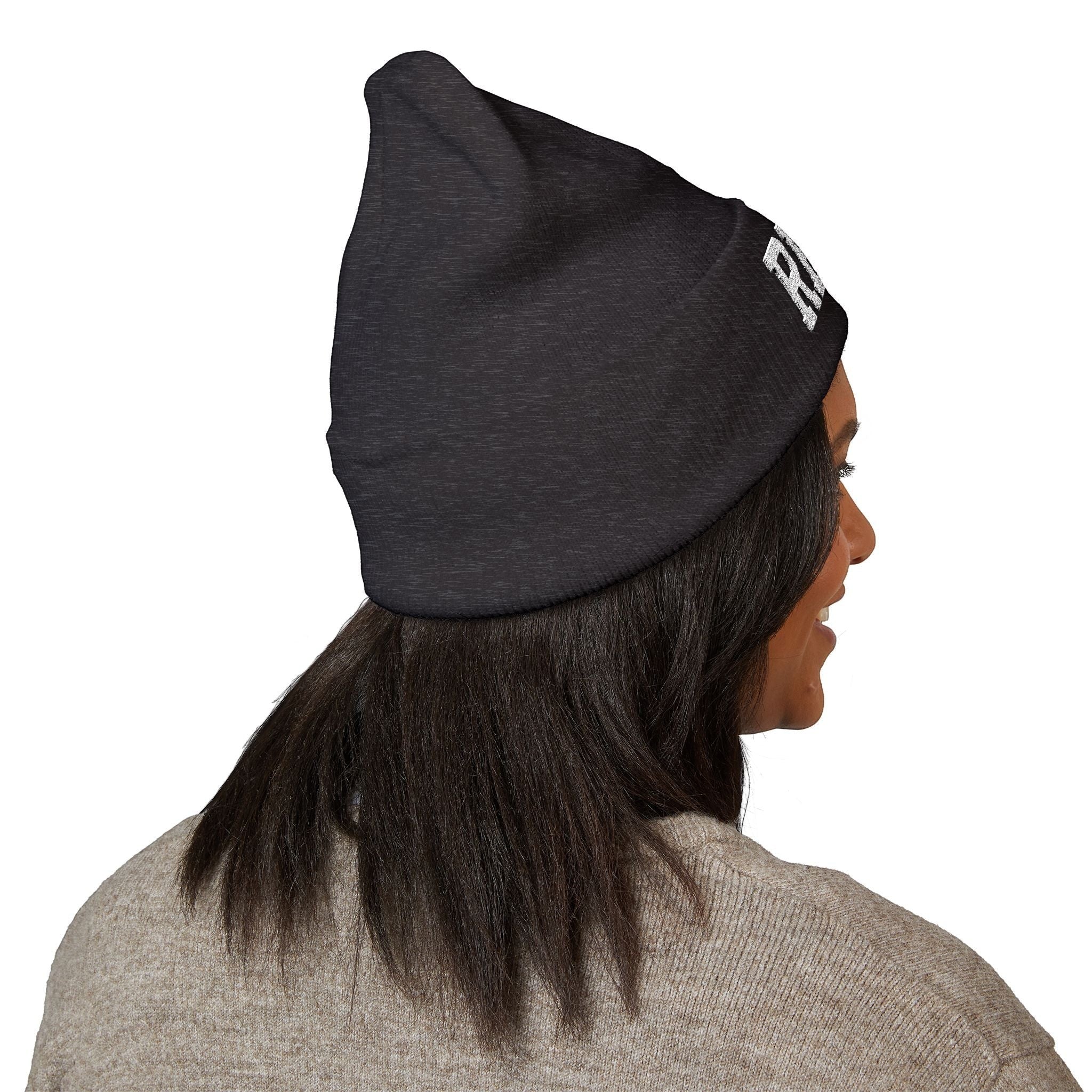 Ruff Part of Town black cuffed acrylic beanie with embroidered RPT logo and paw accent, worn by a woman.