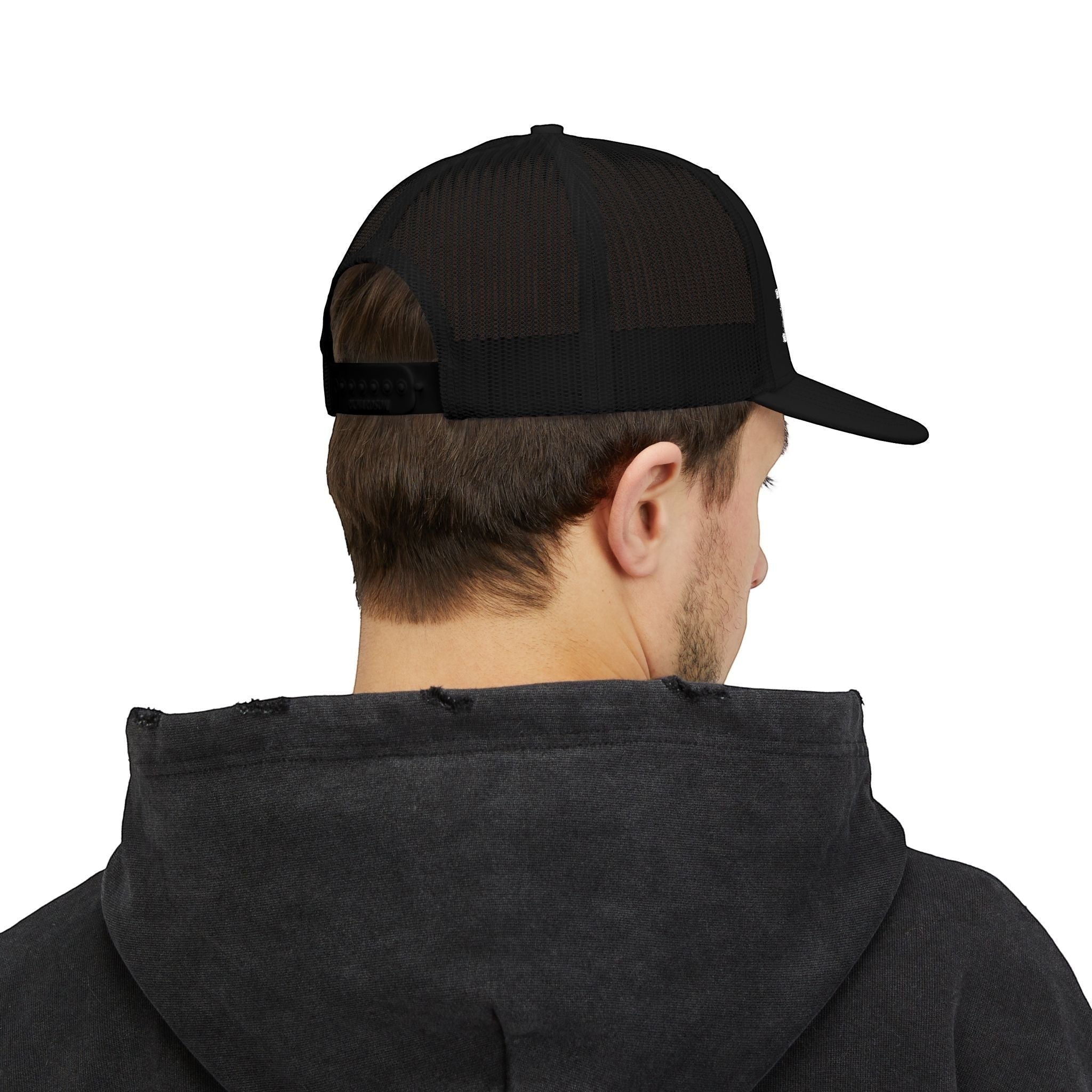 Ruff Part of Town black trucker cap with "WHERE UNDERDOGS BECOME LEGENDS" tagline, mesh back, and adjustable snap closure.