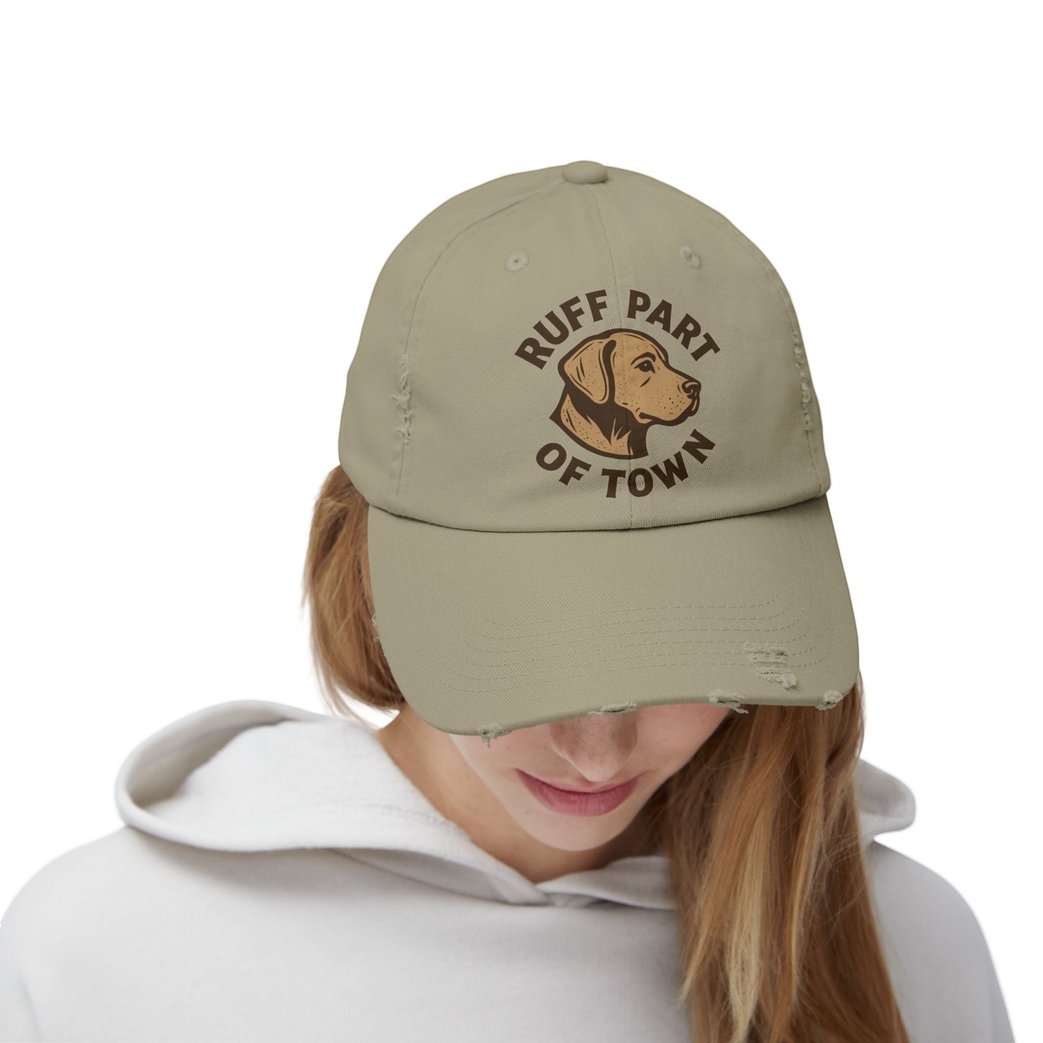 Ruff Part of Town distressed tan cotton twill cap with embroidered dog graphic and text. Adjustable strap.