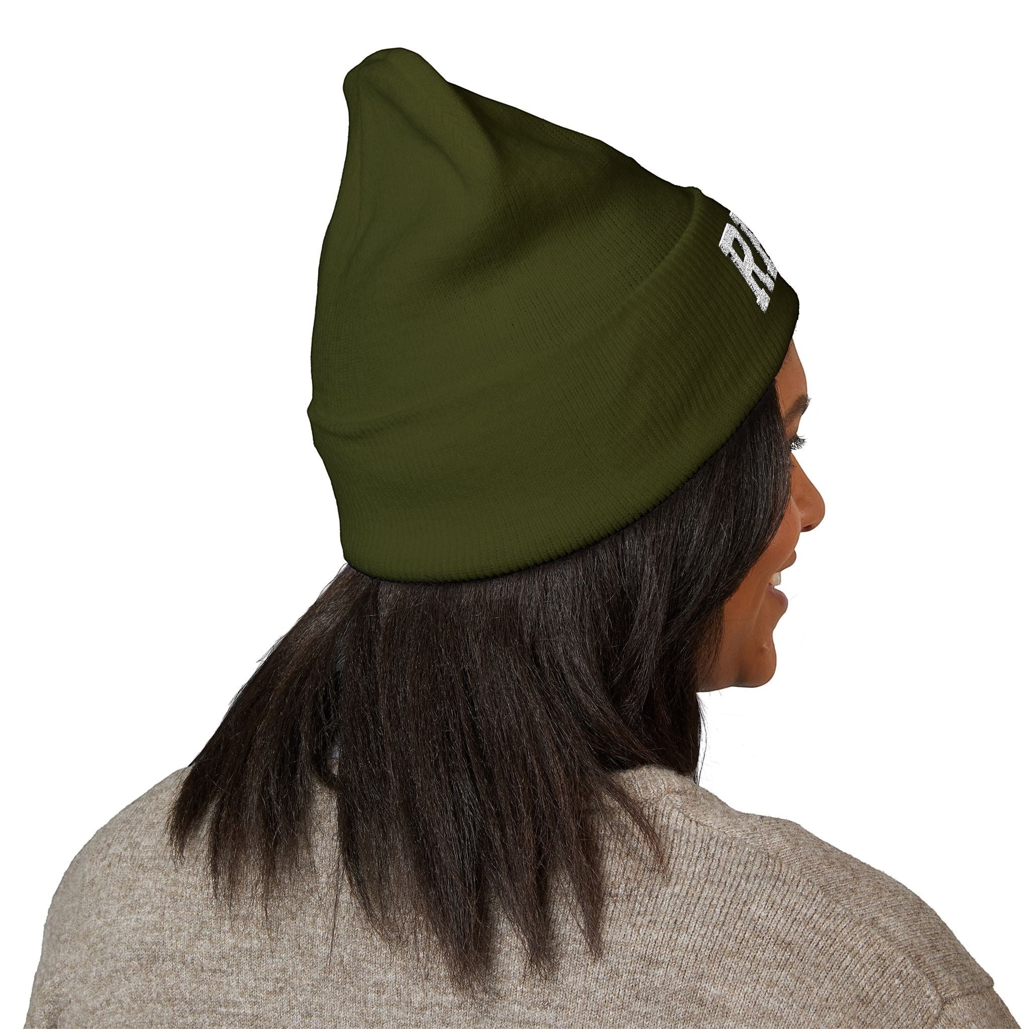 Ruff Part of Town olive green acrylic cuffed beanie with white RPT paw embroidery. Model shown from back.